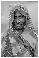 Elderly woman with head scarf. Khajuraho, Madhya Pradesh, India (black and white)