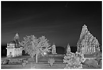 Temples of the Western Group at night. Khajuraho, Madhya Pradesh, India (black and white)