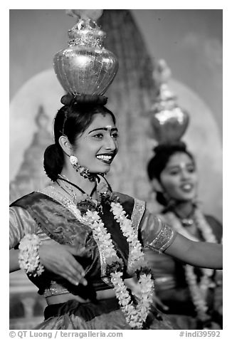 Women dancing with jars on head, Kandariya show. Khajuraho, Madhya Pradesh, India (black and white)