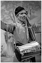 Man performing at Kandariya art and culture show. Khajuraho, Madhya Pradesh, India (black and white)