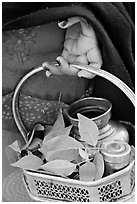 Basket with temple ritual offerings. Khajuraho, Madhya Pradesh, India (black and white)