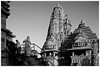 Woman with offering pot in front of Lakshmana temple. Khajuraho, Madhya Pradesh, India ( black and white)