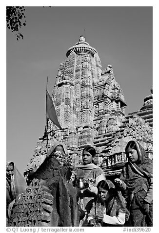 Morning Puja in front of Lakshmana temple. Khajuraho, Madhya Pradesh, India (black and white)