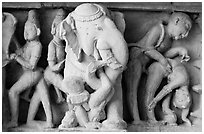 Elephant and Mithuna figures, Lakshmana temple. Khajuraho, Madhya Pradesh, India (black and white)