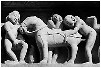 Sculptures with shocking sexual activity, Lakshmana temple. Khajuraho, Madhya Pradesh, India (black and white)