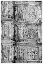 Carvings on the outside of Kadariya-Mahadeva temple including erotic figures. Khajuraho, Madhya Pradesh, India (black and white)