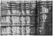 Sculptures on the outside of Kadariya-Mahadeva temple. Khajuraho, Madhya Pradesh, India (black and white)