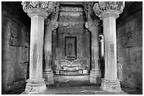 Columns and inner sanctum (garbhagriha) of Lakshmana temple. Khajuraho, Madhya Pradesh, India (black and white)