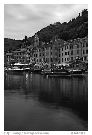 Yachts and fishing boats in Harbor at dusk, Portofino. Liguria, Italy