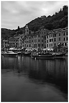 Yachts and fishing boats in Harbor at dusk, Portofino. Liguria, Italy ( black and white)