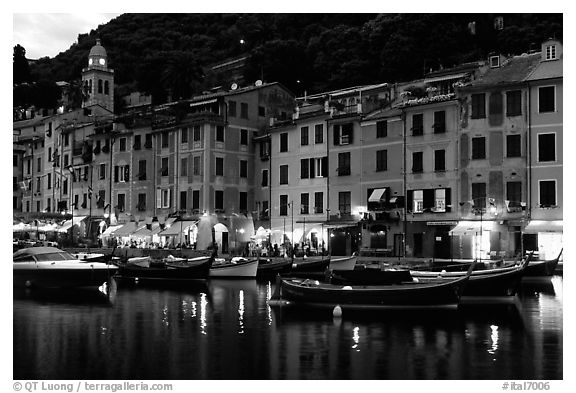 Pastes-colored houses around harbor at dusk, Portofino. Liguria, Italy (black and white)