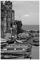 Fishing boats, harbor, and Mediterranean Sea, Riomaggiore. Cinque Terre, Liguria, Italy ( black and white)