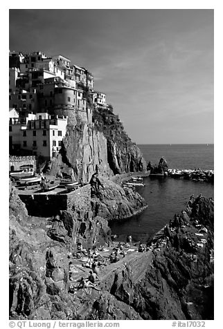 Sunbathers in Manarola. Cinque Terre, Liguria, Italy (black and white)