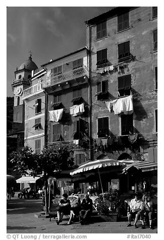 Resting at outdoor terrace on Piazza Guglielmo Marconi, Vernazza. Cinque Terre, Liguria, Italy (black and white)