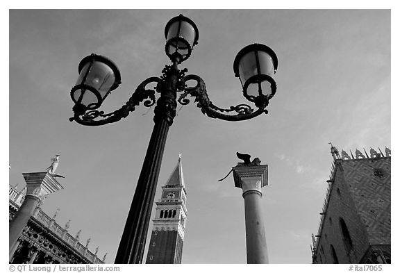 Lamps, Campanile, column with Lion, Piazza San Marco (Square Saint Mark), early morning. Venice, Veneto, Italy