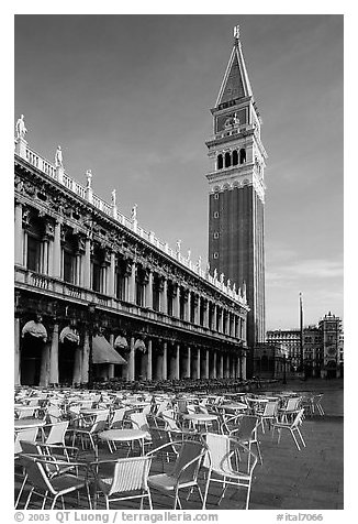 Campanile, Zecca, and empty chairs, Piazza San Marco (Square Saint Mark), early morning. Venice, Veneto, Italy