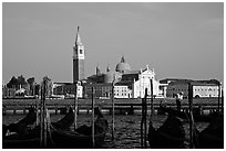 Gondolas, Canale della Guidecca, San Giorgio Maggiore church, late afternoon. Venice, Veneto, Italy (black and white)