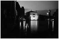 Grand Canal at night with lighted palace. Venice, Veneto, Italy ( black and white)