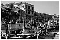 Parked gondolas on the the Grand Canal. Venice, Veneto, Italy ( black and white)