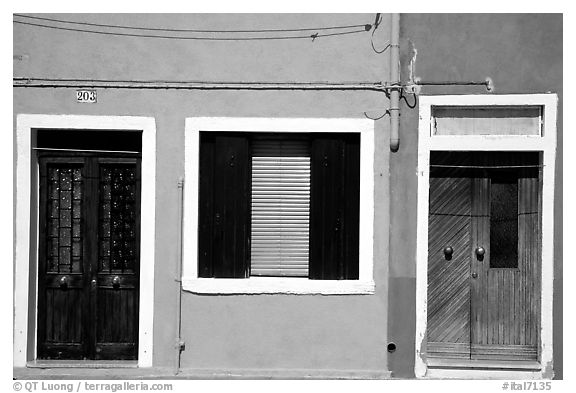 Doors, window, multicolored houses, Burano. Venice, Veneto, Italy (black and white)