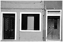 Doors, window, multicolored houses, Burano. Venice, Veneto, Italy (black and white)