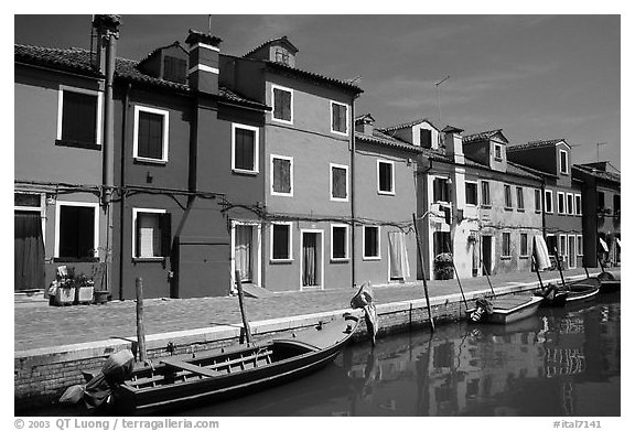 Canal bordered by colorfully painted houses, Burano. Venice, Veneto, Italy