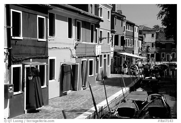 Canal bordered by multicolored  houses, Burano. Venice, Veneto, Italy