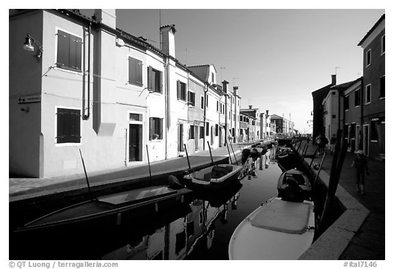 Colorful painted houses along canal, Burano. Venice, Veneto, Italy