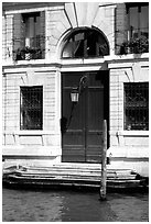 Doorway and steps on the Grand Canal. Venice, Veneto, Italy ( black and white)