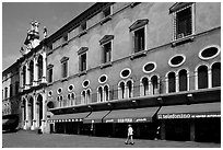 Store in renaissance building, Piazza dei Signori. Veneto, Italy (black and white)