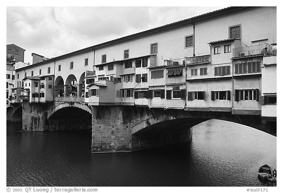 Ponte Vecchio (1345),  old bridge lined with shops. Florence, Tuscany, Italy (black and white)
