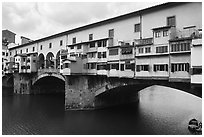 Ponte Vecchio (1345),  old bridge lined with shops. Florence, Tuscany, Italy (black and white)