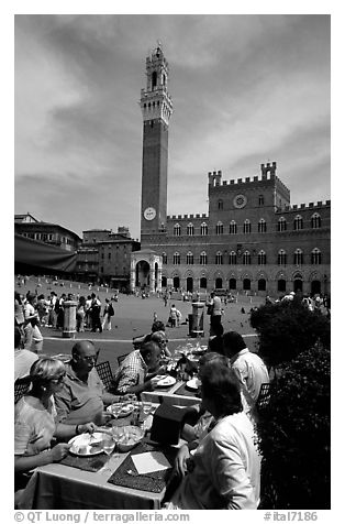 Outdoor dinning on Piazza Del Campo. Siena, Tuscany, Italy (black and white)