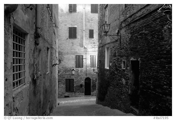 Narrow streets at dawn. Siena, Tuscany, Italy (black and white)