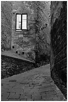 Street and window at dawn. Siena, Tuscany, Italy (black and white)