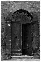 Old door. Siena, Tuscany, Italy (black and white)