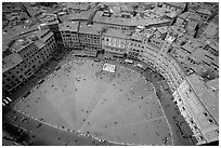 The square paving divided into nine sectors, representing members of the Coucil of Nine.. Siena, Tuscany, Italy ( black and white)