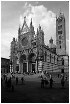 Richly decorated cathedral facade, afternoon. Siena, Tuscany, Italy (black and white)