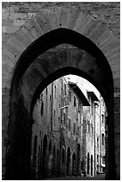 Arch and street. San Gimignano, Tuscany, Italy (black and white)