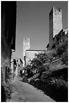 Street dominated by medieval towers. San Gimignano, Tuscany, Italy ( black and white)