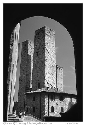 Medieval Towers framed by an arch. San Gimignano, Tuscany, Italy (black and white)