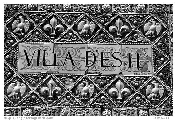 Ceramic sign at the entrance of Villa d'Este. Tivoli, Lazio, Italy (black and white)