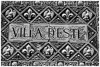 Ceramic sign at the entrance of Villa d'Este. Tivoli, Lazio, Italy (black and white)