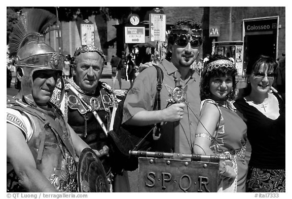 Roman Legionnaires pose with tourists, Roman Forum. Rome, Lazio, Italy