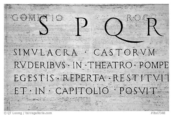 Inscription in Latin with the SPQR letters of the Ancient Roman Empire. Rome, Lazio, Italy (black and white)