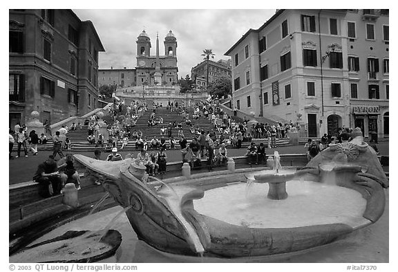 Fontana della Barcaccia at the foot of the Spanish Steps. Rome, Lazio, Italy (black and white)