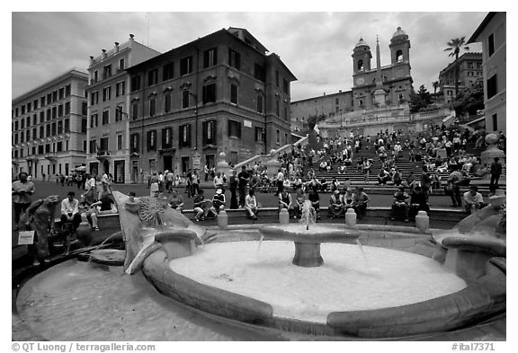 Fontana della Barcaccia at the foot of the Spanish Steps. Rome, Lazio, Italy (black and white)