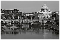 Ponte Sant'Angelo over the Tiber, and Basilica San Pietro, sunrise. Vatican City (black and white)