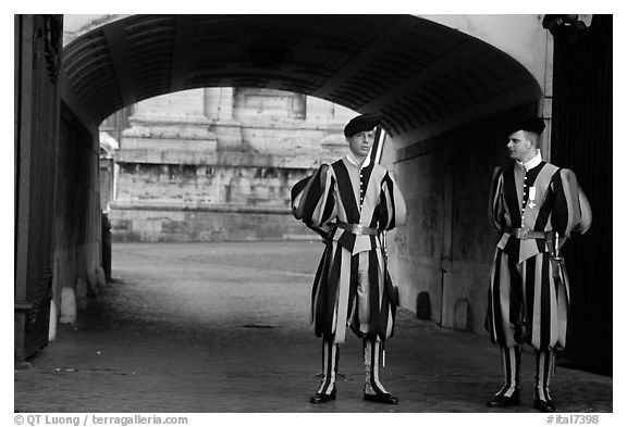 Swiss guards in blue, red, orange and yellow  Renaissance uniform. Vatican City (black and white)