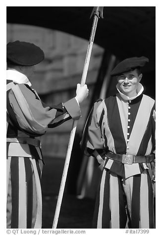Papal Swiss guards in colorful traditional uniform. Vatican City (black and white)